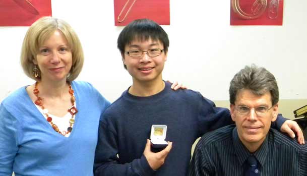 Eric Tan with his Theory Teachers Lynn and Peter Ware